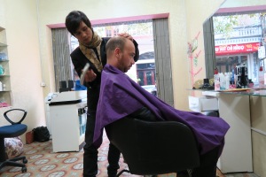 Edgar gets his hair cut in Ninh Vinh